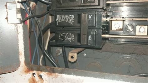 electrical breaker box buzzing|circuit breaker making crackling noise.